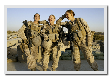 Photo of three women soldiers smiling.